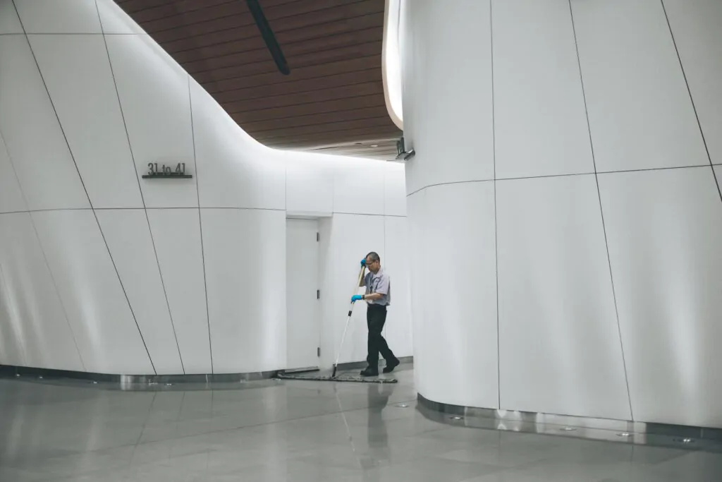 Janitor cleaning a commercial space