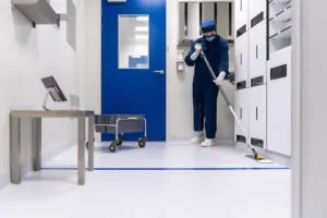Janitorial and commercial cleaner mopping the floor
